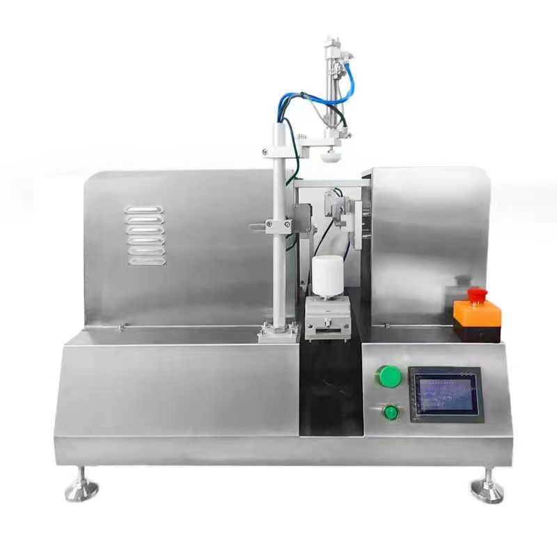 Semi-automatic single tube filling and sealing machine