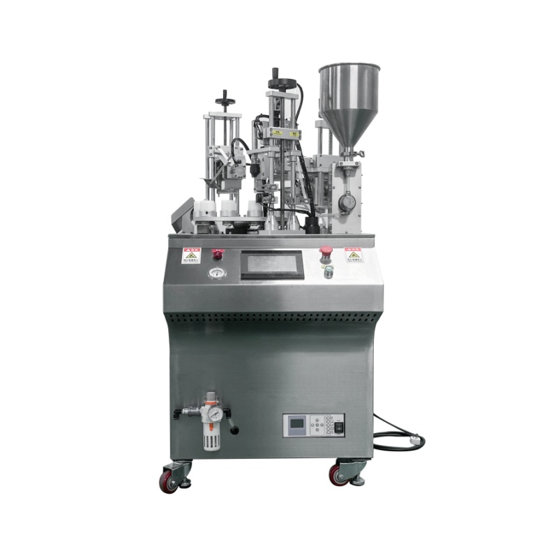 Small ten station filling and sealing machine