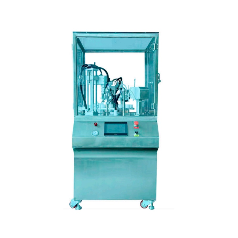 F I L L ING AND CAPPING MACHINE